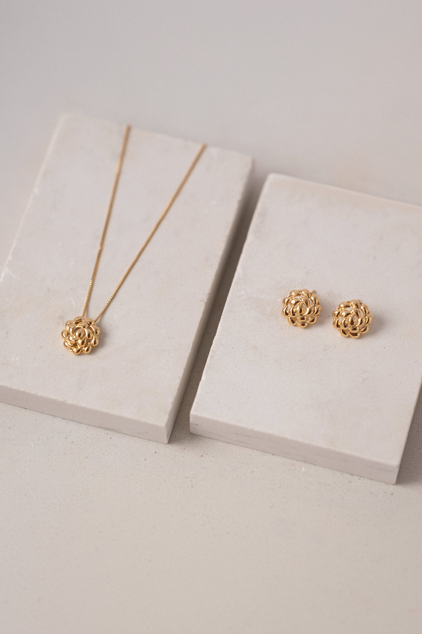 Radiant Gold Floral Stud Earrings