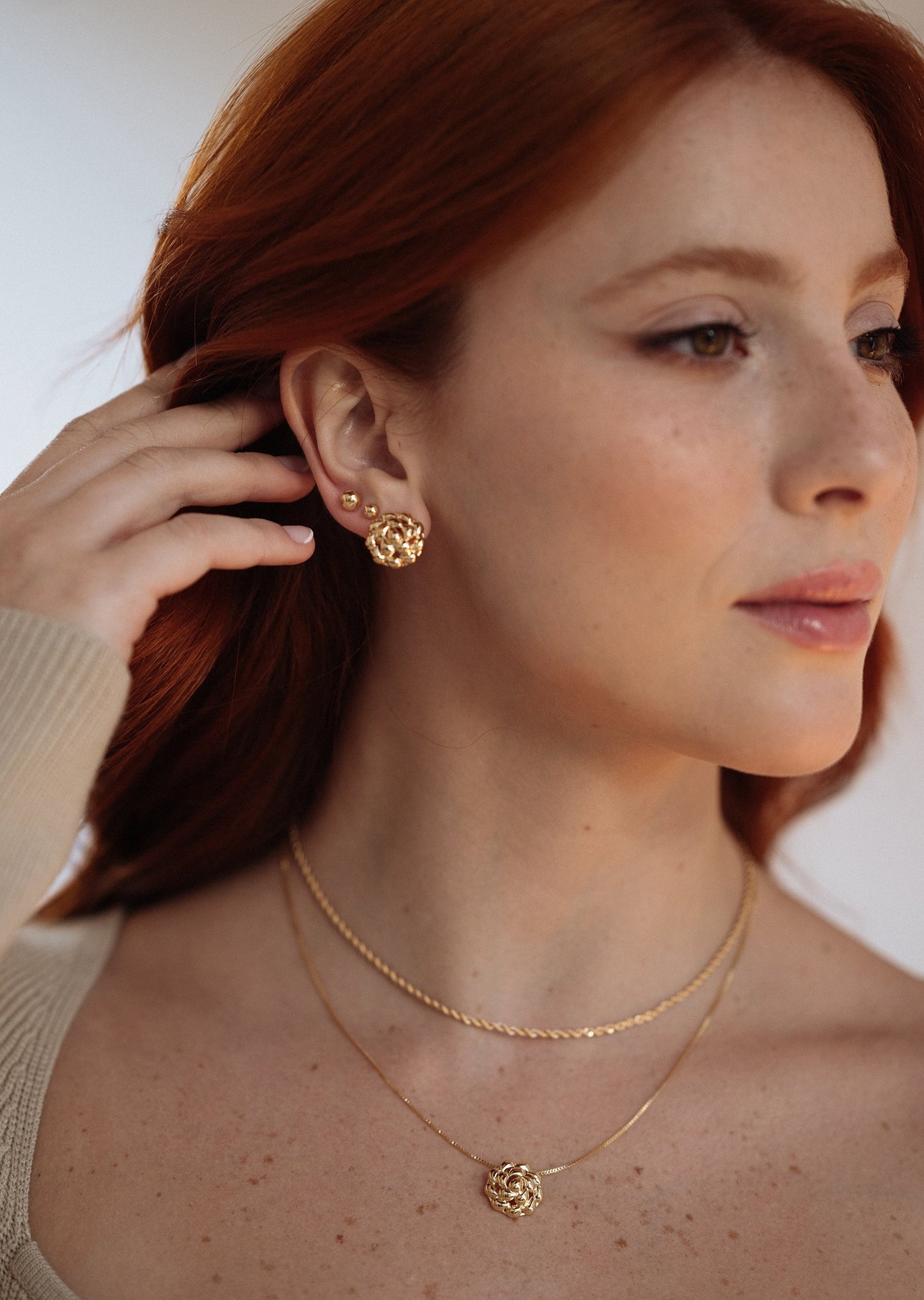 Radiant Gold Floral Stud Earrings